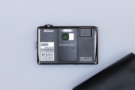 Nikon Coolpix S1000pj Projector Compact Digital Camera (Black)